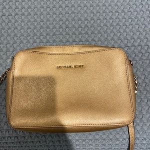 Micheal Kors gold purse